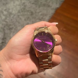 Gold Michael khors watch with purple face